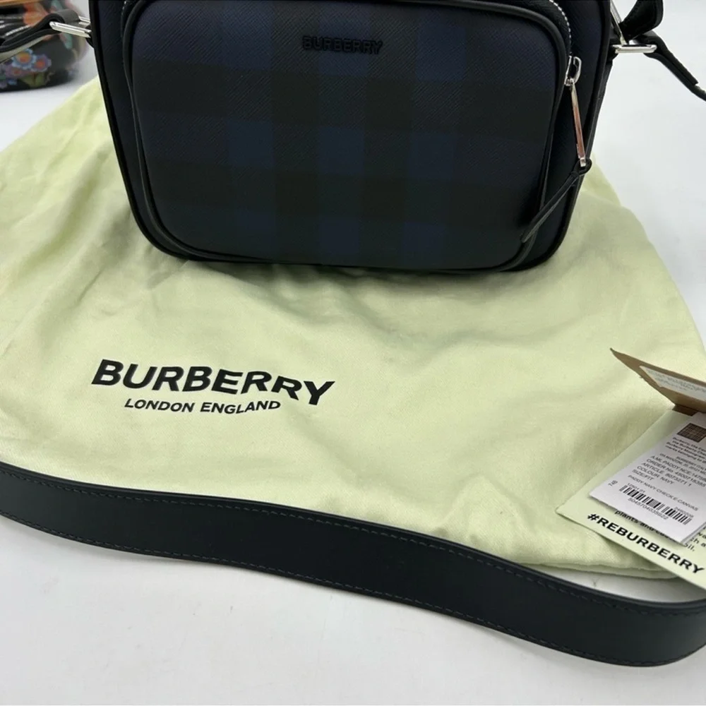 Men’s Burberry check messenger bag in navy blue. Adjustable shoulder strap NWT.